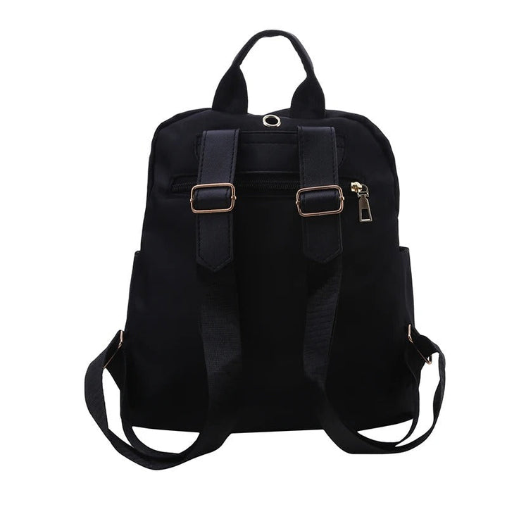 Stijlvolle zwarte PU leren dames rugzak, perfect voor dagelijks gebruik en onderweg.