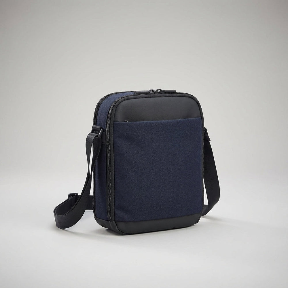 Crossbody tas heren met RFID bescherming, veilige opslag voor pasjes en reisdocumenten, in modern grijs.