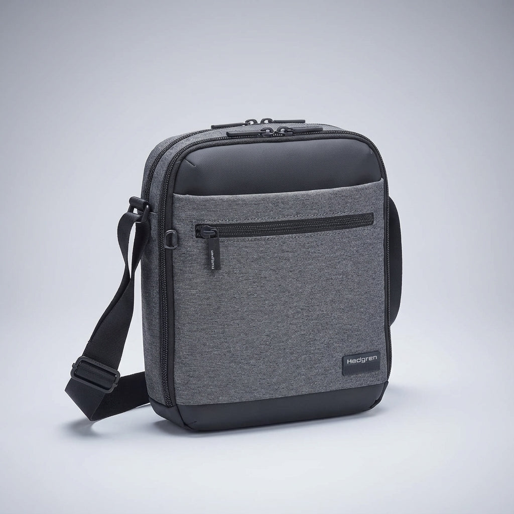 Multifunctionele heren crossbody tas in stijlvol grijs, waterafstotend en met veilige RFID bescherming.