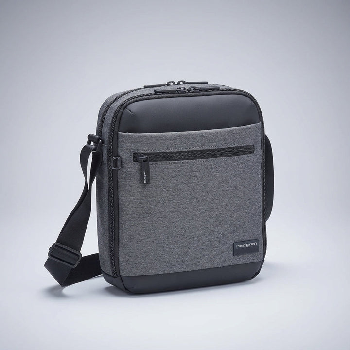 Multifunctionele heren crossbody tas in stijlvol grijs, waterafstotend en met veilige RFID bescherming.