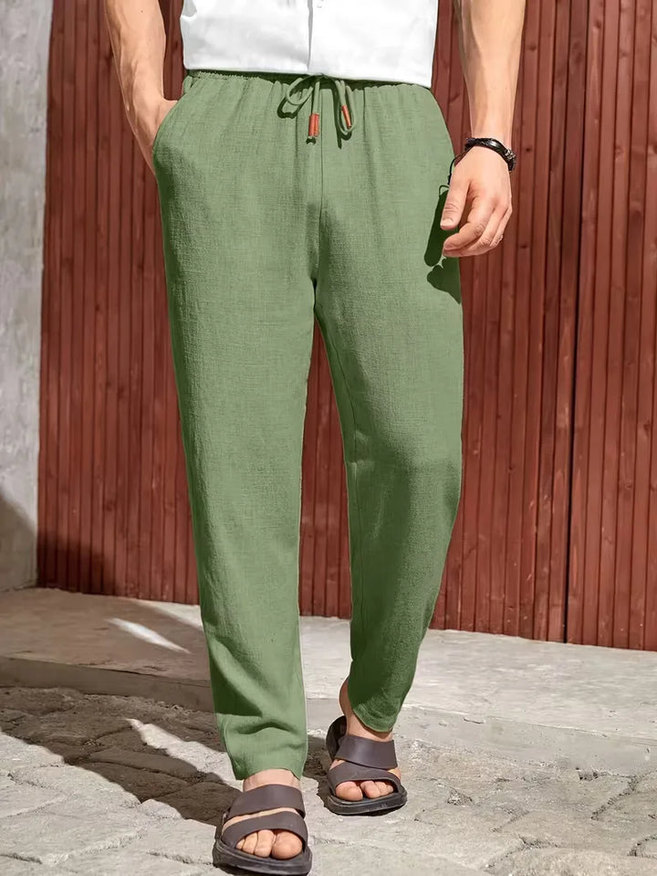 Zwarte heren pantalon, straight leg pasvorm, trekkoord, casual, ademend en comfortabel.