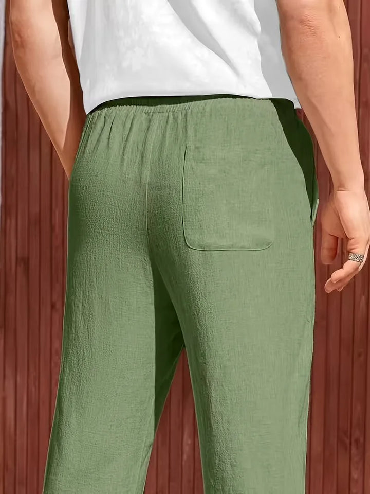 Zwarte casual heren pantalon, rechte pijp, trekkoord, ademend en comfortabel.