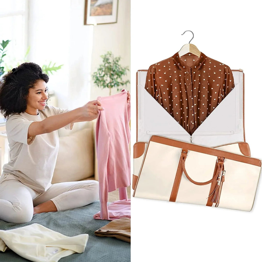 Arno opvouwbare kledingtas met stevige handvatten en afneembare schouderriem voor comfort.