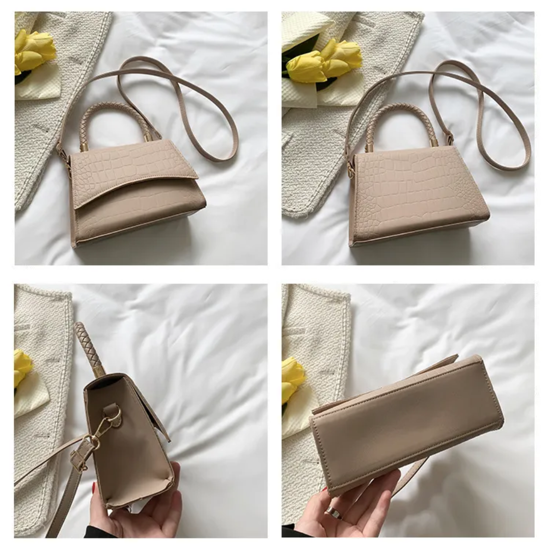 Dames handtas in khaki PU leer, gedragen als trendy crossbodytas. Stijlvol accessoire met bovenhandvat.