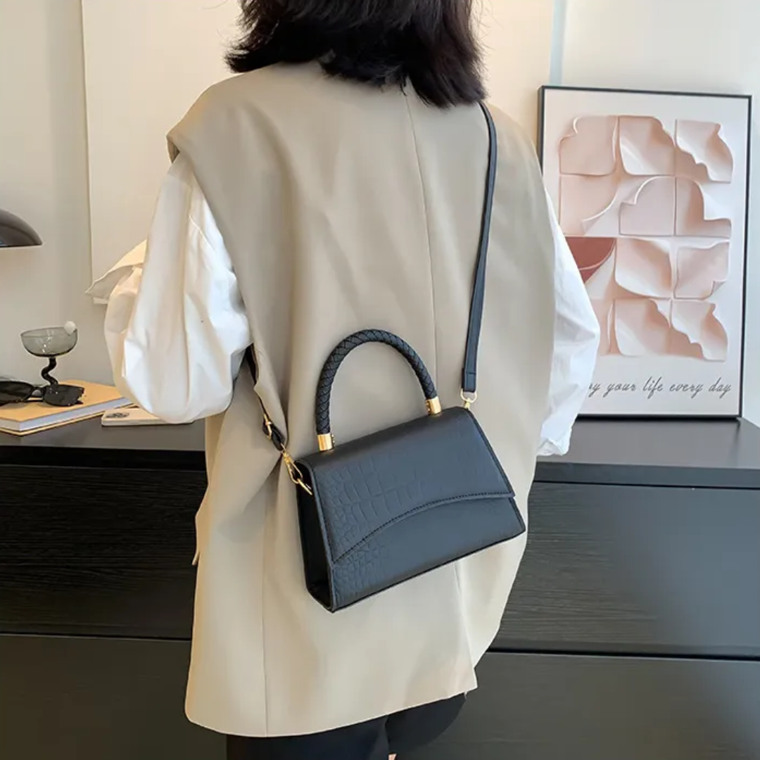 Stijlvolle khaki PU leren dames handtas. Perfect accessoire met bovenhandvat, ook te dragen als schouder- of crossbodytas.