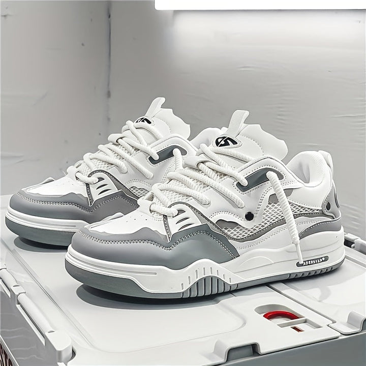 Ryker herensneaker in zwart-grijs, dynamisch en veelzijdig, geschikt voor sportieve en casual outfits.
