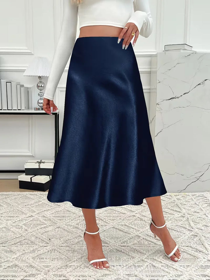Bordeauxrode satijnen rok, midi lengte, hoge taille, perfect voor diners.