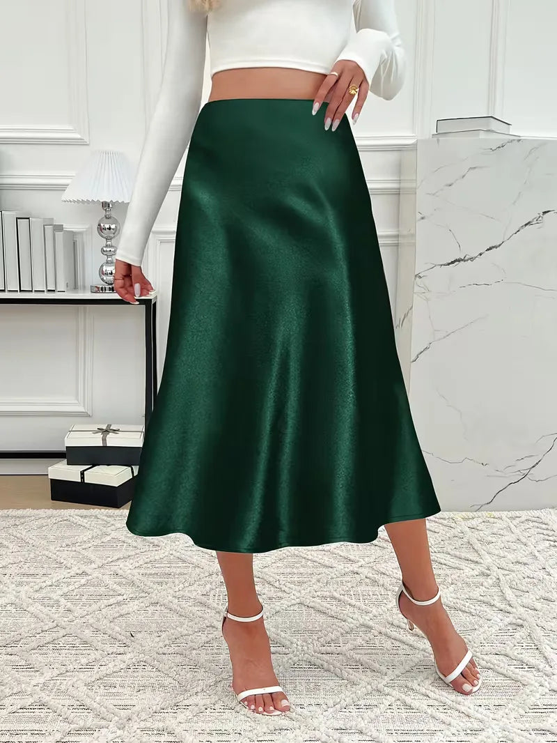 Roze satijnen rok, hoge taille, elegante flowy stof, perfect voor dames.