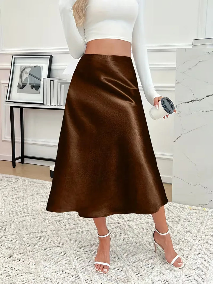 Mintgroene satijnen midi rok, hoge taille, fris en elegant voor de lente.