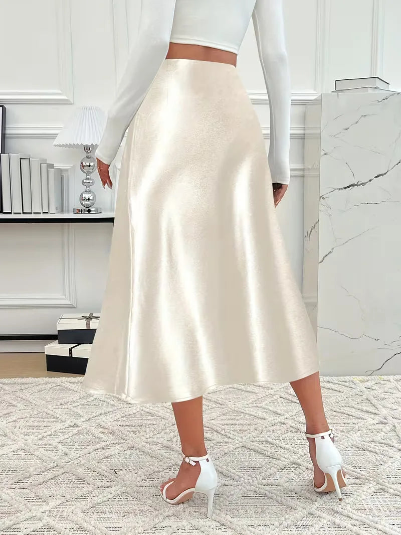 Lichtroze satijnen midi rok, hoge taille, zacht en vrouwelijk voor dames.