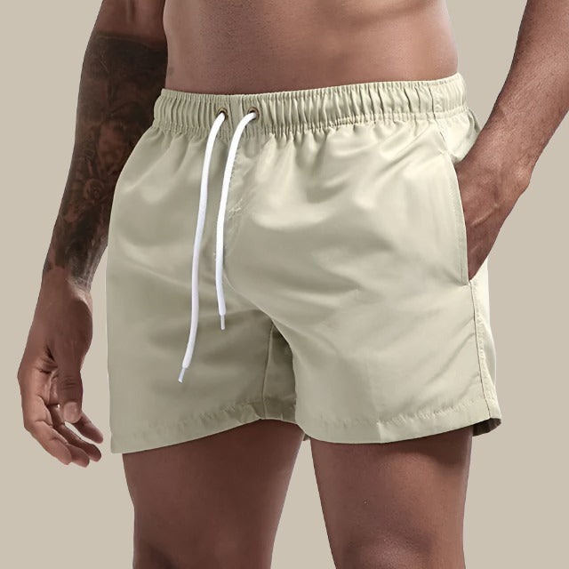 Grijze sneldrogende zwemshorts voor mannen, perfect voor een dagje aan het strand of zwembad, casual herenmode.