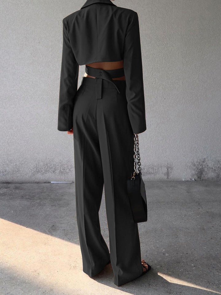 Trendy zwarte dames zomer set: cropped blazer & high-waist broek. Ideaal voor een elegante of casual look.