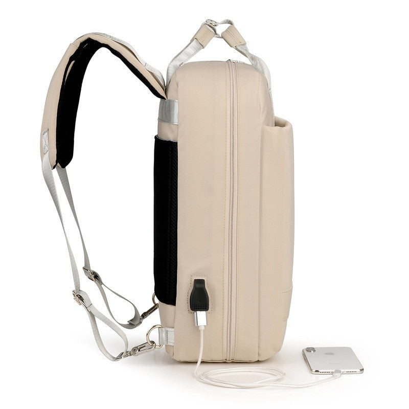 Moderne unisex dagrugzak in antraciet, voorzien van anti-diefstal functies en een geïntegreerde USB-lader.