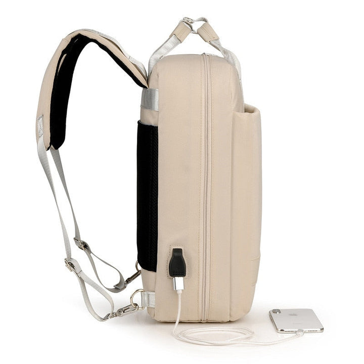 Moderne unisex dagrugzak in antraciet, voorzien van anti-diefstal functies en een geïntegreerde USB-lader.