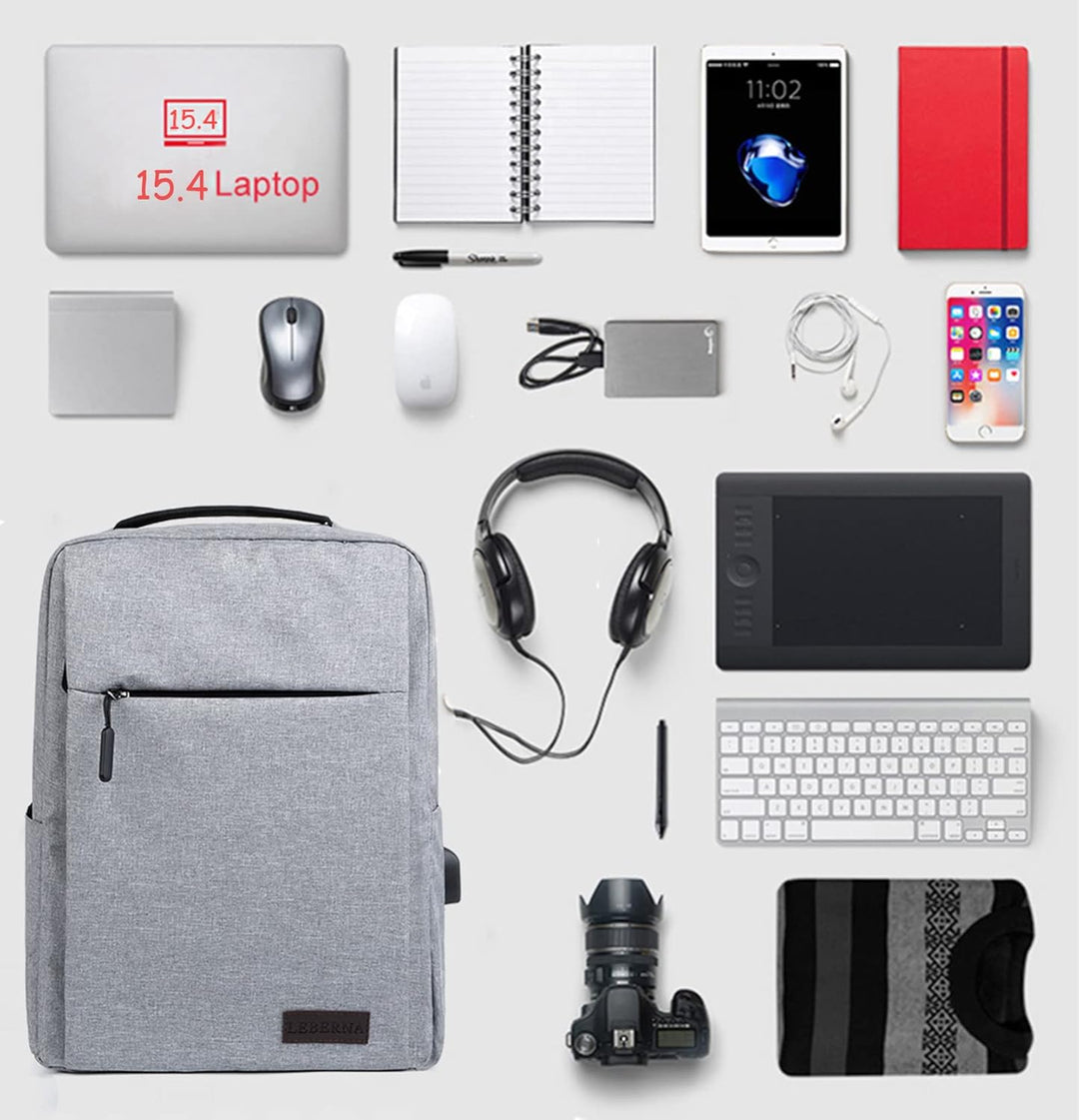 Zijkant van de slanke zwarte laptoprugzak, toont het compacte en minimalistische profiel.