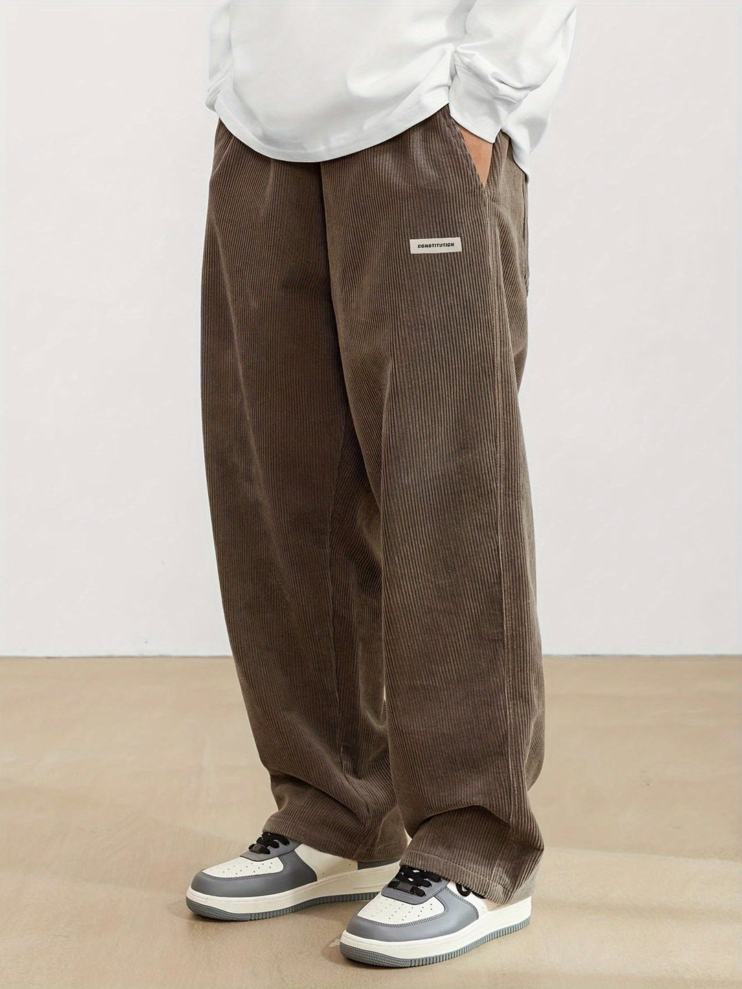Zwarte zomerse corduroy broek voor heren, zacht ribfluweel, ademend en comfortabel voor warme dagen, veelzijdige stijl.