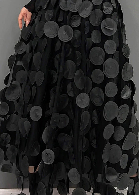Luchtige midi damesrok met zwierige stippenprint, perfect voor een stijlvolle en comfortabele lente outfit.
